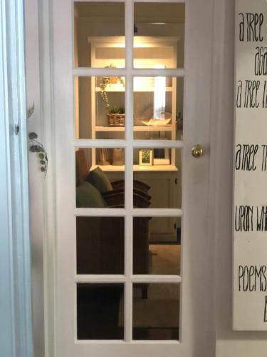 a door with a window in a room at Pet Friendly Acer Arena Accommodation in Sydney