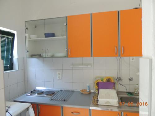 Η κουζίνα ή μικρή κουζίνα στο Apartments Suljic - Cash Only Property
