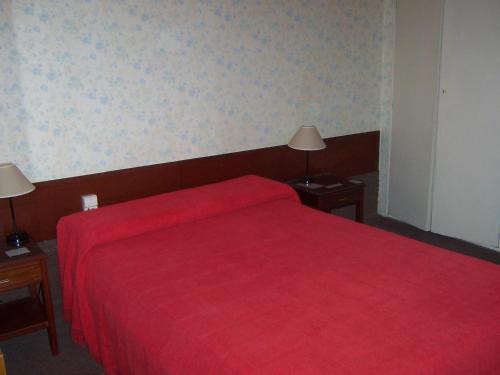 Postel nebo postele na pokoji v ubytování Hotel Arenas