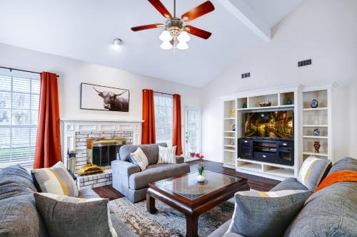 a living room with two couches and a fireplace at Nr Sea World Games WiFi BBQ Yard Pet Ok in San Antonio