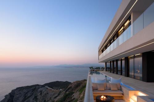 Seafront Cliff Villa with Infinity Pool & Wellness, By ThinkVilla