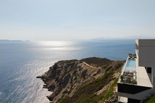 Seafront Cliff Villa with Infinity Pool & Wellness, By ThinkVilla