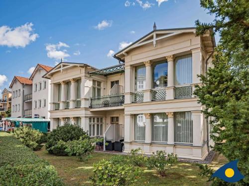 a large white building with balconies on it at Ostseevilla Whg 01 in Bansin