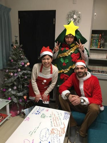 a group of people dressed up in christmas costumes at OUCHI HOTEL Yokogawa in Hiroshima