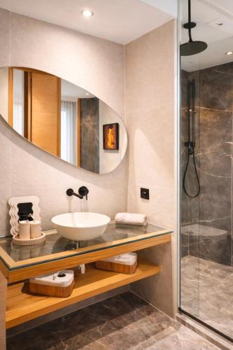 a bathroom with a sink and a shower at Auralys Seaside Studio avec balcon in Casablanca