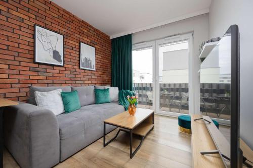 Modern Apartment with Parking & Balcony Suited For Remote Work by Noclegi Renters