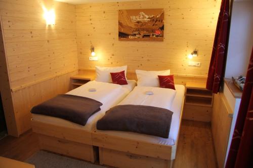 Postel nebo postele na pokoji v ubytování Apartmenthaus Innerkratzerhof