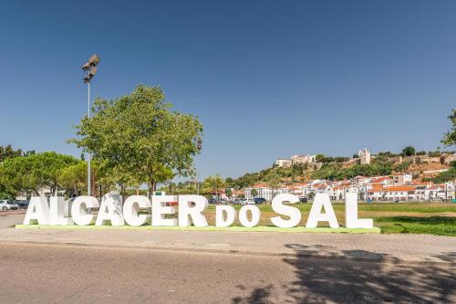 a large sign that saysazaeder do sell on the side of a road at GuestReady - Enchanting retreat in Alcácer do Sal in Alcácer do Sal