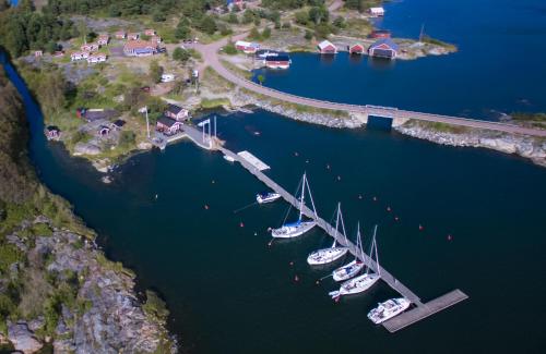 an aerial view of boats docked in a harbor at Kumlinge Stugor in Kumlinge