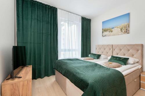 2-Bedroom Family Apartment with Parking and Balcony by Noclegi Renters