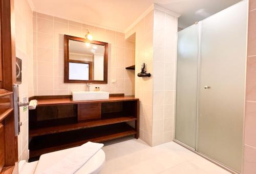 a bathroom with a sink and a shower at Villa Noa Amazing Sea view in Kaş