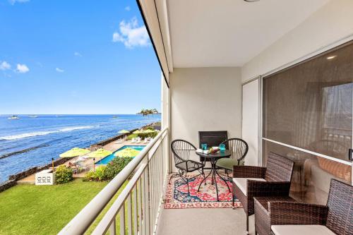 a balcony with a view of the ocean at Lahaina Roads 302 in Lahaina