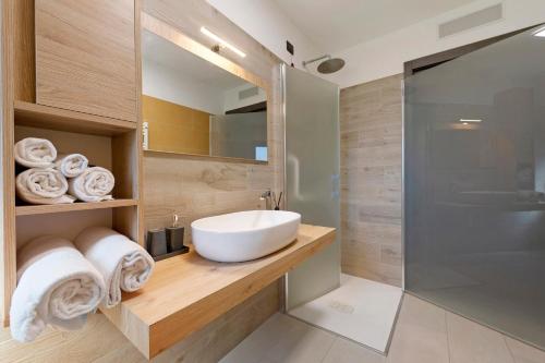 a bathroom with a sink and a shower at Appartamenti Suly 2 - Cir0083 in Saint Vincent