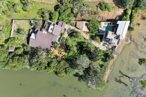 an aerial view of a house next to the water at Allure Yala Luxury Suites by Allure Leisure in Yala