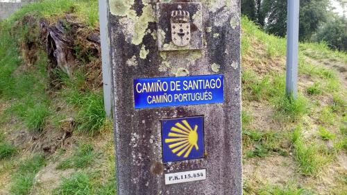 a sign on the side of a hill at TurisMar Vila do Conde in Macieiro da Maia