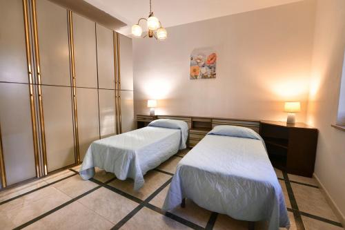 a hospital room with two beds in it at Casa Rita in Gonnosfanàdiga