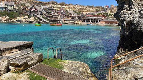 a view of a body of water with boats in it at MALTA TOURs in St. Paul's Bay