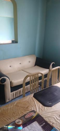 a baby crib with a bed and a mirror at James breazy hill in Sandy Bay
