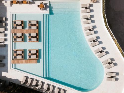 a model of a resort with a swimming pool at NĒRO Boutique Hotel in Imerovigli