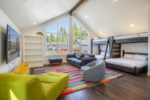 a living room with a bunk bed and a couch at Cabin, Bonus Suite, Suncadia Pool Access in Cle Elum