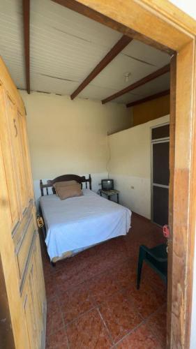 a bedroom with a bed in a room at Accommodation in Copán Ruinas #5 in Copán Ruinas