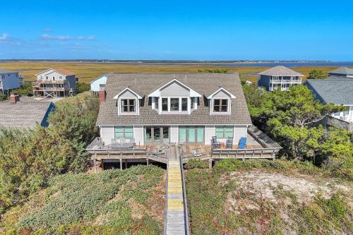 an aerial view of a house on a hill at Jonahs Whale by Oak Island Accommodations in Caswell Beach