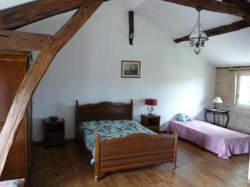 Postel nebo postele na pokoji v ubytování La Croisée Verte
