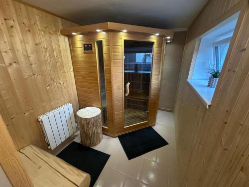 a small bathroom with a shower in a room at Hauspark Residence in Žatec