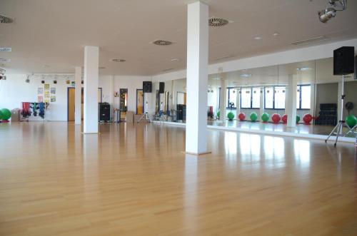 Fitness centrum a/nebo fitness zařízení v ubytování Hotel Ambiente