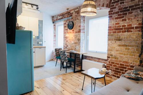 Kaszubska Vintage Brick Loft Apartment by BookingHost