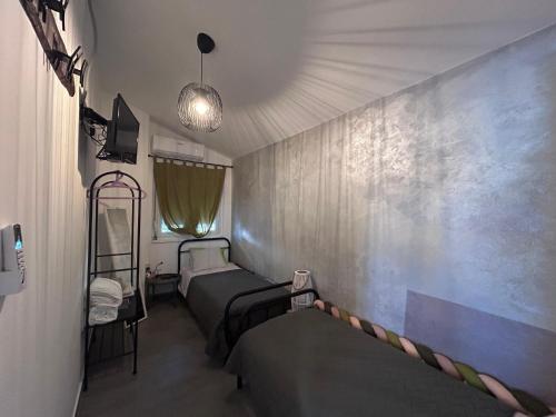 a room with two bunk beds and a wall at Apartment Marija in Petrcane
