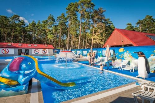 Two-story holiday home right on the beach, pool