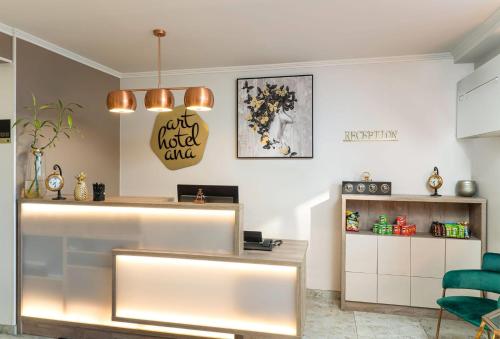 a salon with a reception desk and a chair at Arthotel ANA Liberty, Trademark Collection by Wyndham in Bremen