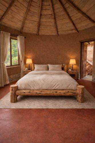 a bedroom with a bed made out of logs at Sarayu Farmstays in Manāli