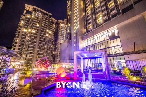 a view of a city at night with buildings at Premium Suites D'lement Genting Highlands by BYON in Genting Highlands