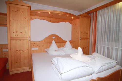 Ein Bett oder Betten in einem Zimmer der Unterkunft Mutmanör