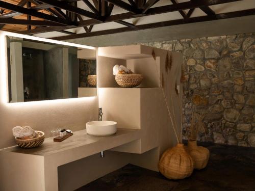 a bathroom with a sink and a mirror at Springfontein River Lodge in Stanford