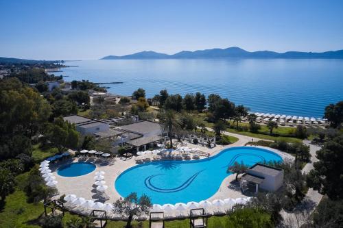 an aerial view of a resort with a pool at Hydra Beach Resort in Thermisía