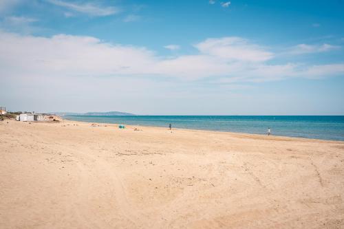 Villa Blue Beach - terrasse - parking - plage - Village Naturiste