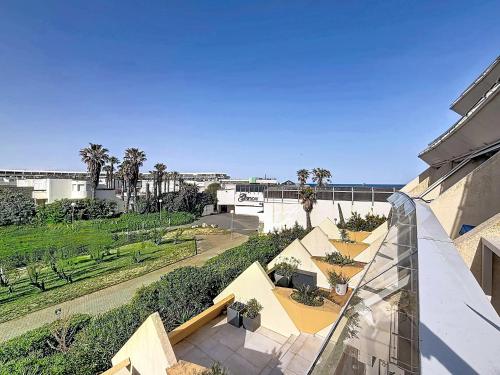 Studio luxe L'Aphrodite C49 avec terrasse vue mer au village naturiste Héliopolis