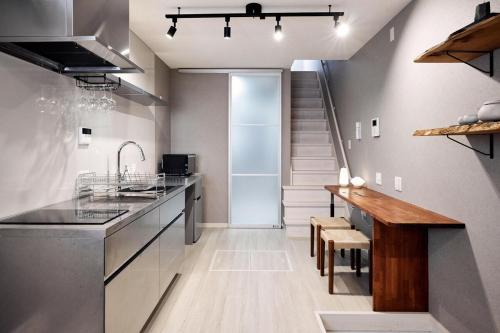 2-minute walk from the station Traditional Japanese products High-quality amenities Direct access to KIX Easy access to Kyoto, Osaka, and Nara Entire building for rent