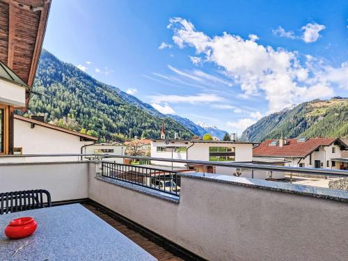 a room with a balcony with a view of mountains at Apartment Handle-2 by Interhome in Ried im Oberinntal