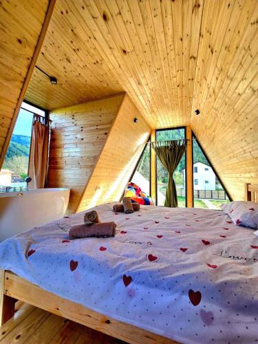 a bedroom with a bed with hearts on it at Borjomi Hills in Borjomi