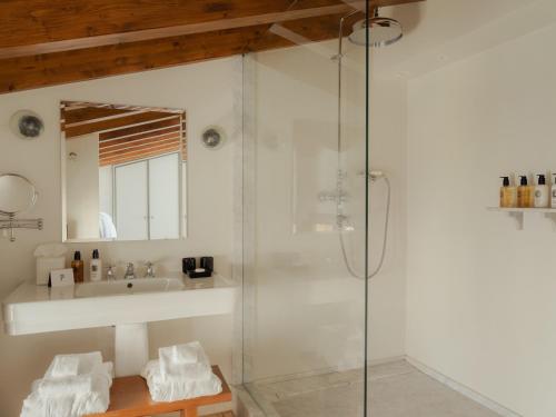 a bathroom with a shower and a sink at Portella Palma in Palma de Mallorca