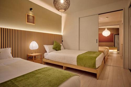 5 minutes by train to Namba Direct access to Namba, Umeda, Tennoji, KIX, and Nara Japanese-style experience 8-minute walk to the station 3 minutes to a large hot spring