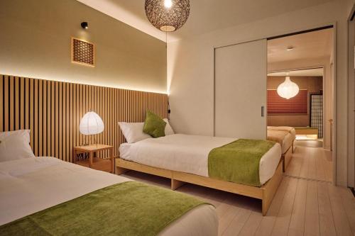 5 minutes by train to Namba Direct access to Namba, Umeda, Tennoji, KIX, and Nara Japanese-style experience 8-minute walk to the station 3 minutes to a large hot spring
