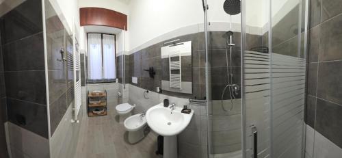a bathroom with a sink and a toilet at Il Viandante in Catanzaro