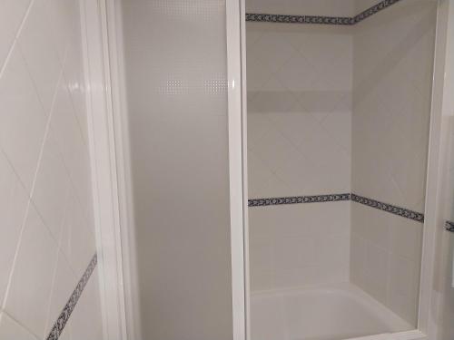 a walk in shower with a glass door at La Garzona in Losar de la Vera