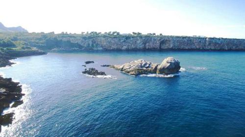 an island in the middle of a large body of water at Casa Vacanze Chiara in Terrasini