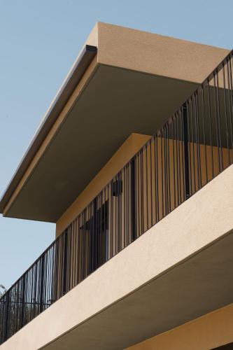 a balcony of a building with a railing at Villa Nebbiu Vista in Oletta
